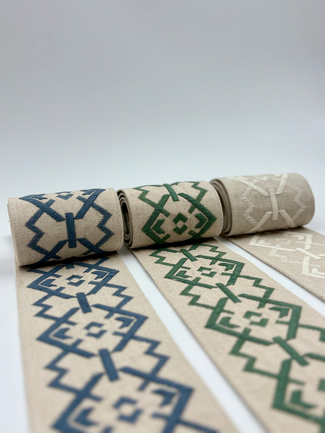 Roman Blinds with Croix Trim in Celadon Green